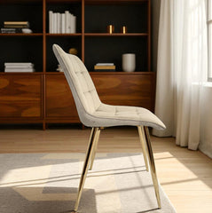 Silla capitone beige lateral en living