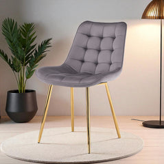 Silla capitone gris frontal en living